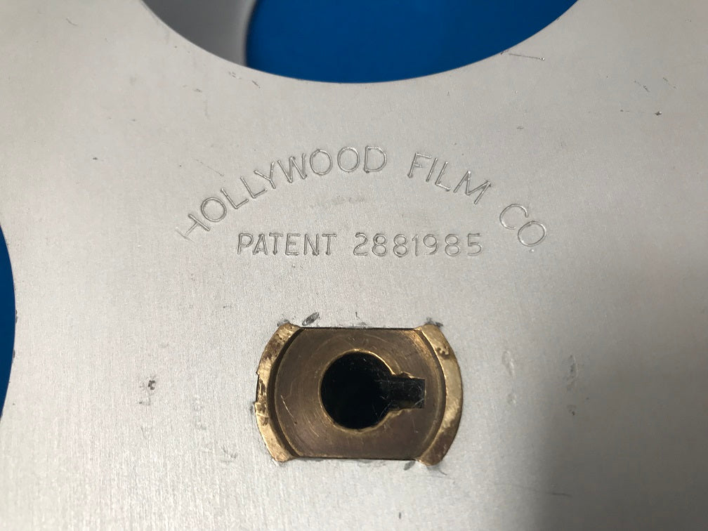 35mm split reel 11 1/2 inch diameter Vintage,(hollywood film company) brand. 5/16 input shaft.