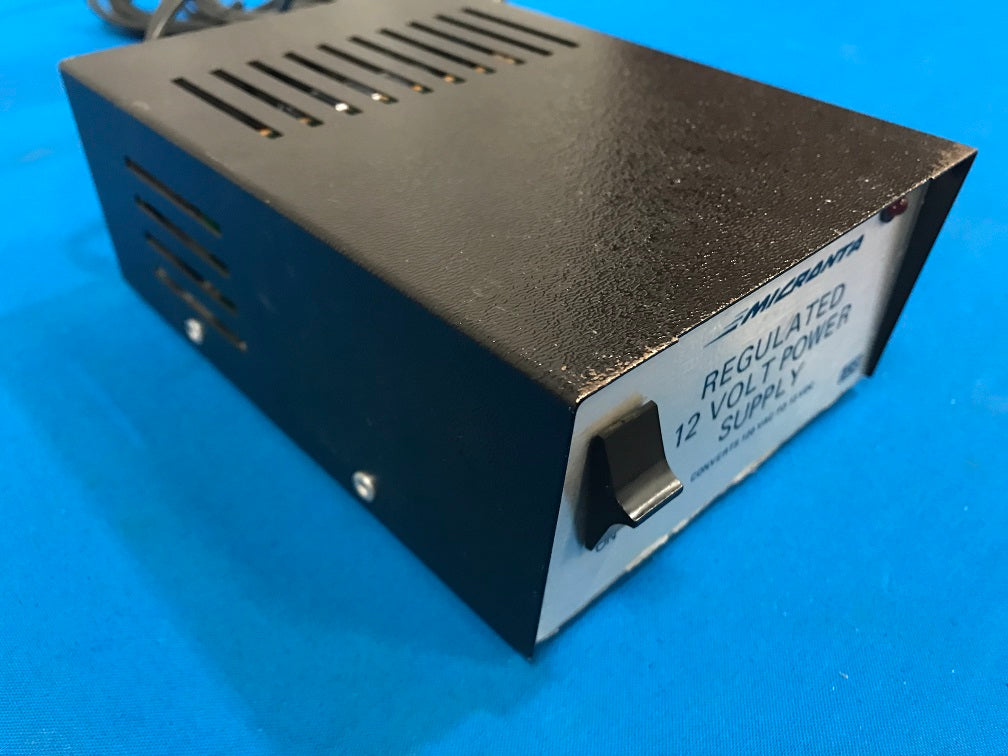 22-124A  MICRONTA Regulated 12vdc Power supply output,  12oVAC Power Cord input power.