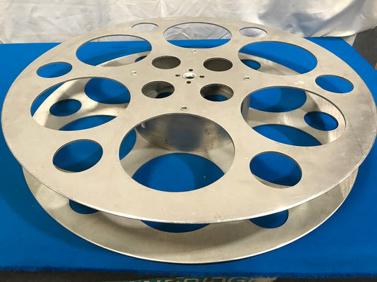 70mm Film reel MFD by: Hollywood Film Company. 22 inch diameter  1/2 inch shaft input.