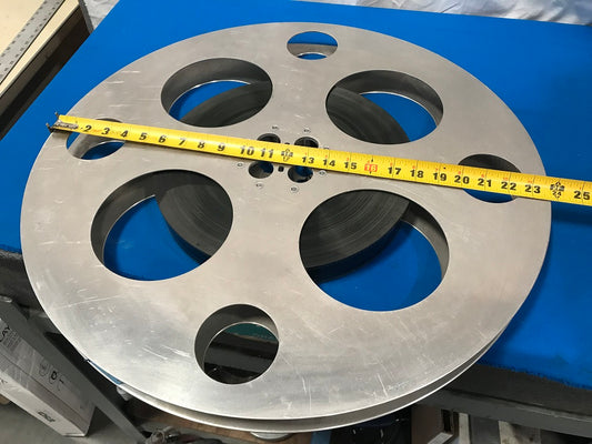 35mm Film reel- Goldberg bros. Inc.   23.75 Diameter,   5/16 shaft input.